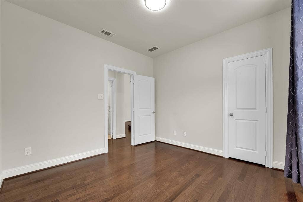 6811 Shady View Court, Sachse, TX 75048 Wood-finish flooring with white trim