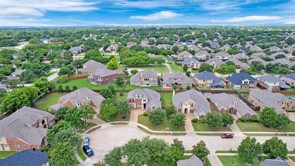 6811 Shady View Court, Sachse, TX 75048 Residential neighborhood featuring mature trees and a curvilinear street layout