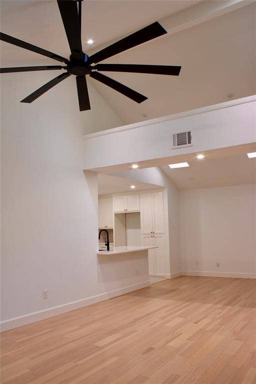 3706 Aries Drive, Garland, TX 75044 Vaulted ceiling with a multi-blade ceiling fan