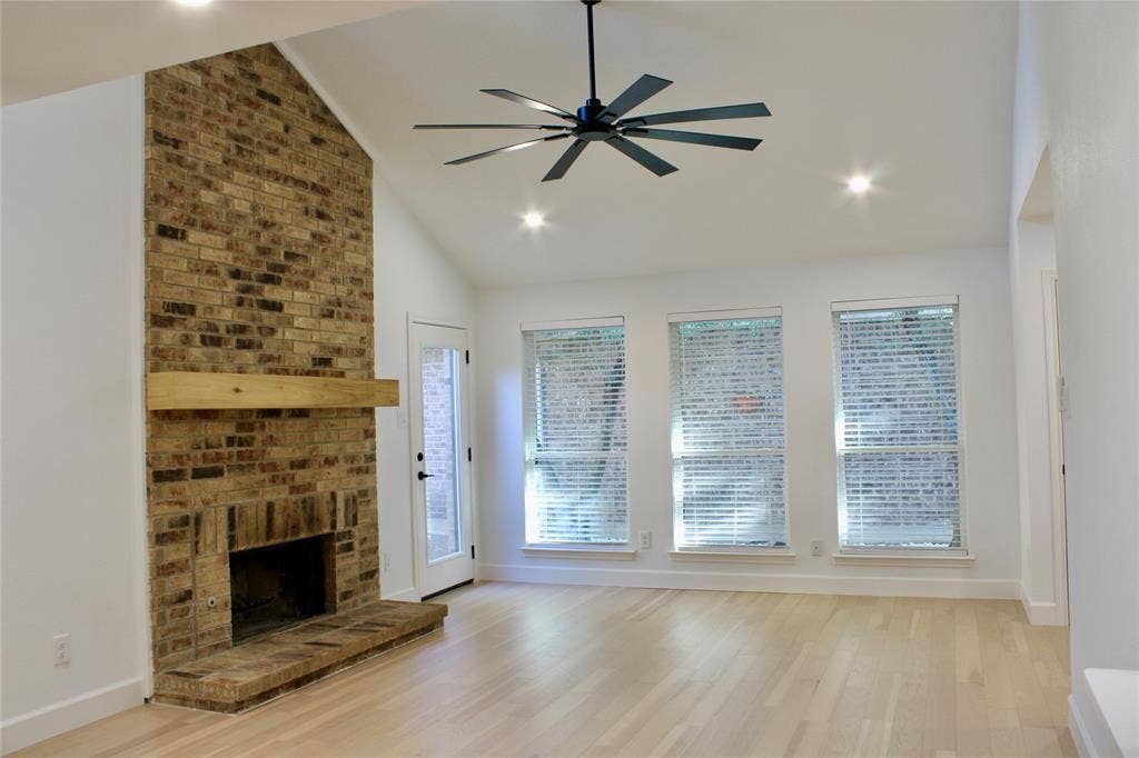 3706 Aries Drive, Garland, TX 75044 Vaulted ceiling with recessed lighting and a ceiling fan