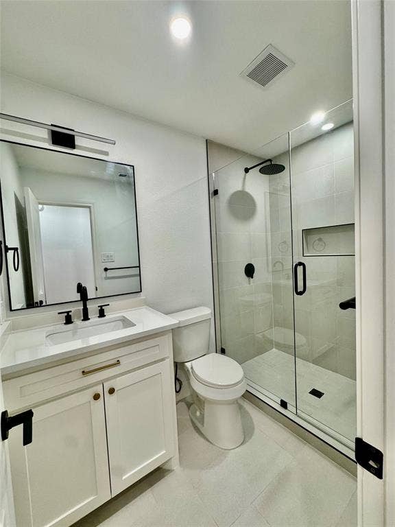 3706 Aries Drive, Garland, TX 75044 White vanity with gold-tone hardware, rectangular undermount sink, and matte black faucet