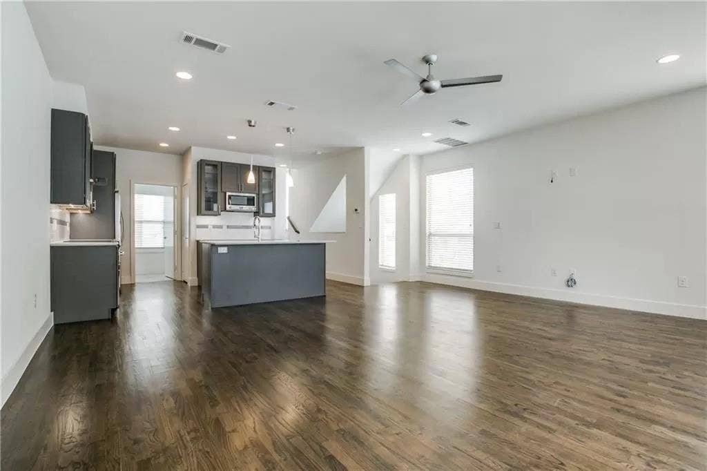 4303 Cole Avenue, #17, Dallas, TX 75205 Open-concept living area featuring wood-finish flooring, recessed lighting, and a contemporary ceiling fan