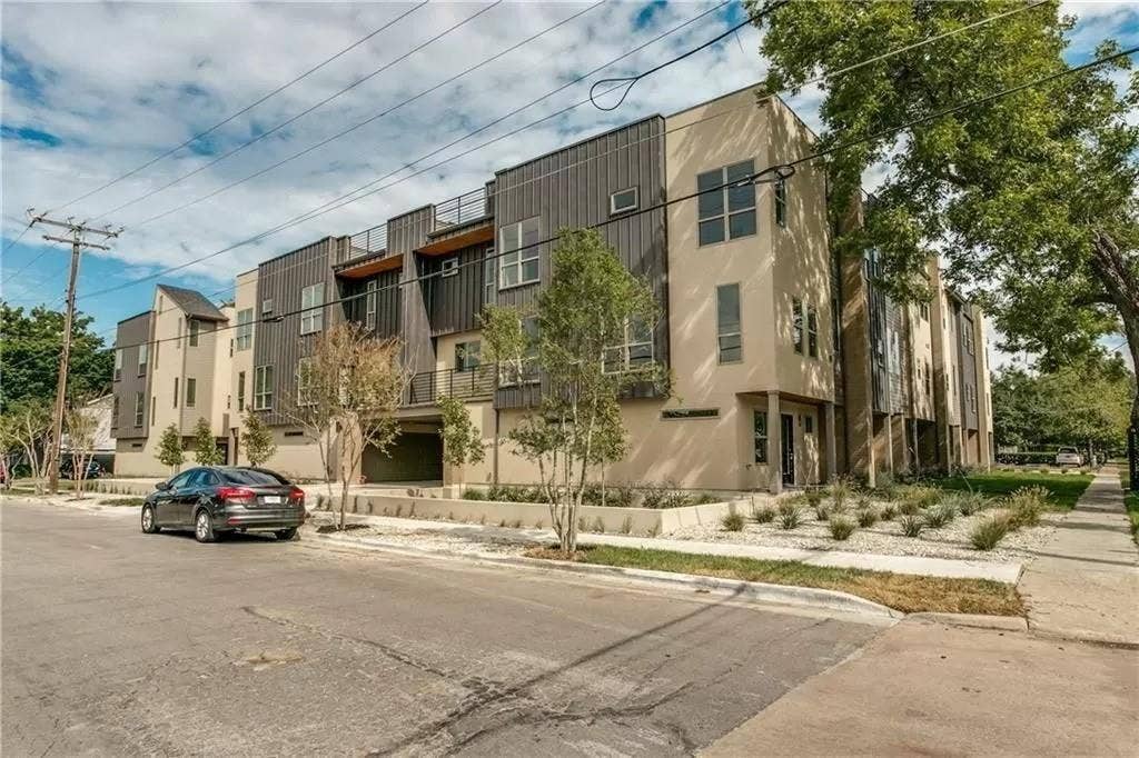 4303 Cole Avenue, #17, Dallas, TX 75205 Contemporary multi-story architecture with a combination of stucco and vertical panel siding