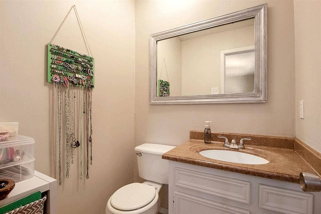 4026 Salem Drive, Garland, TX 75043 Half bath in primary bedroom.