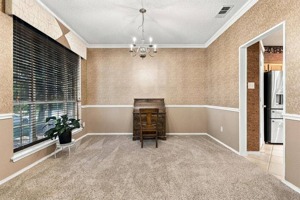 103 Deerpath Road, Hickory Creek, TX 75065 Recessed ceiling, crown molding, chandelier lighting, large window with blinds, and neutral carpet flooring