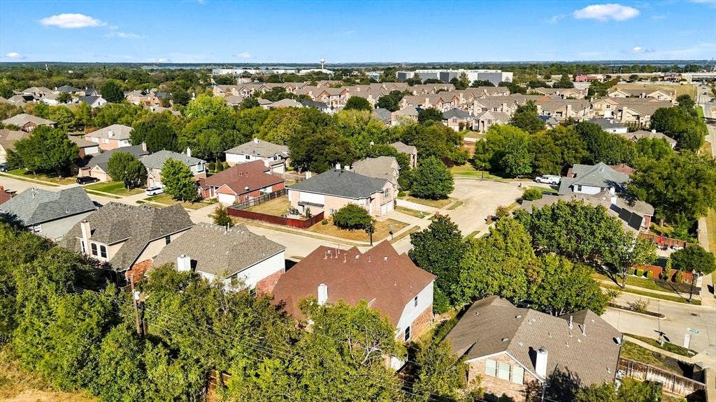 103 Deerpath Road, Hickory Creek, TX 75065 Neighborhood setting featuring mature trees, residential streets, and varied single-family homes