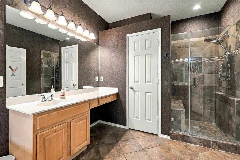 103 Deerpath Road, Hickory Creek, TX 75065 Double vanity with undermount sink and light-toned countertop