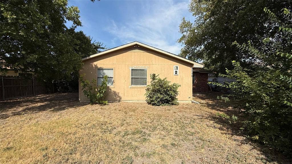 1710 Meridian Way, Garland, TX 75040 Exterior building with a gabled roofline and multiple windows