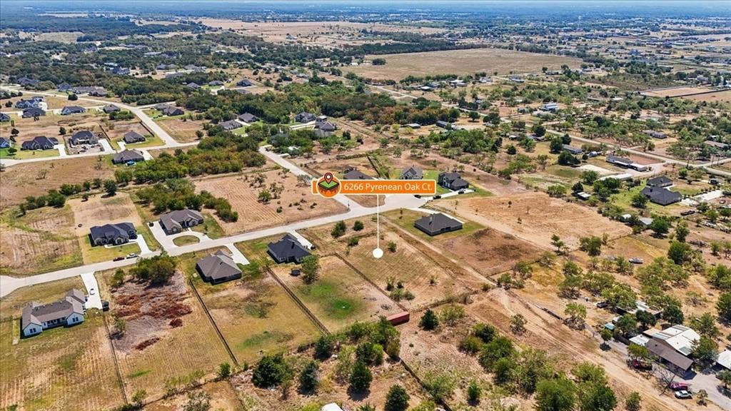 6266 Pyrenean Oak, Royse City, TX 75189 Aerial view showcasing a multi-building compound on expansive acreage with mature landscaping, open pasture land, and established tree coverage throughout the property