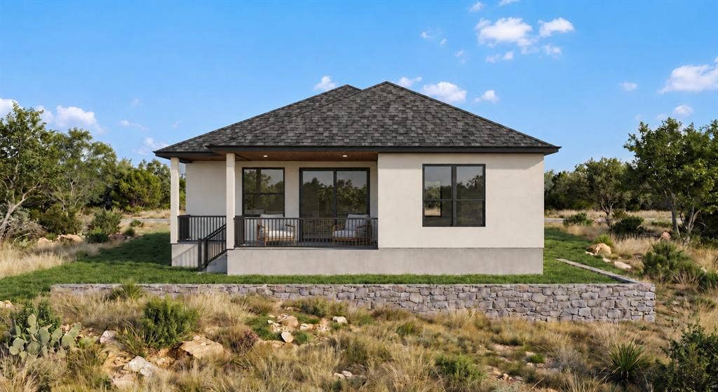 816 Oak Lane, Cottonwood Shores, TX 78657 Architectural rendering of proposed finished home. Final appearance and finishes may vary. Contemporary stucco exterior with a covered rear patio, dark-framed windows, and a shingle roof