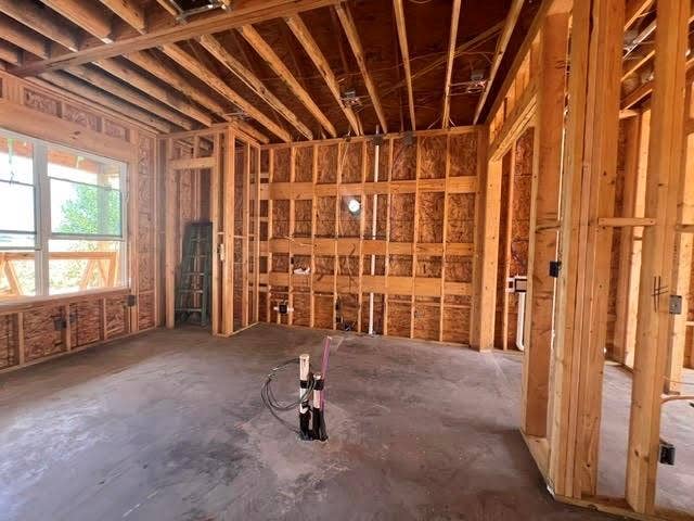 816 Oak Lane, Cottonwood Shores, TX 78657 Standing in the living room looking into the kitchen area