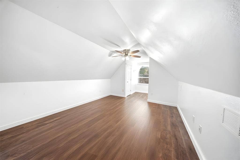 506 Amy Jo Circle, Aubrey, TX 76227 Bedroom or Bonus Room Sloped ceiling room featuring wood-finish flooring, a ceiling fan, and a window