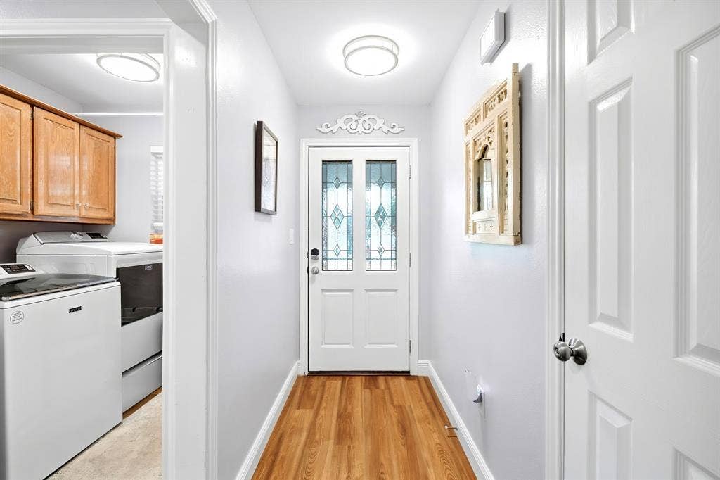 506 Amy Jo Circle, Aubrey, TX 76227 Wood-finish flooring throughout, white paneled interior doors, and a front entry door with decorative glass inserts