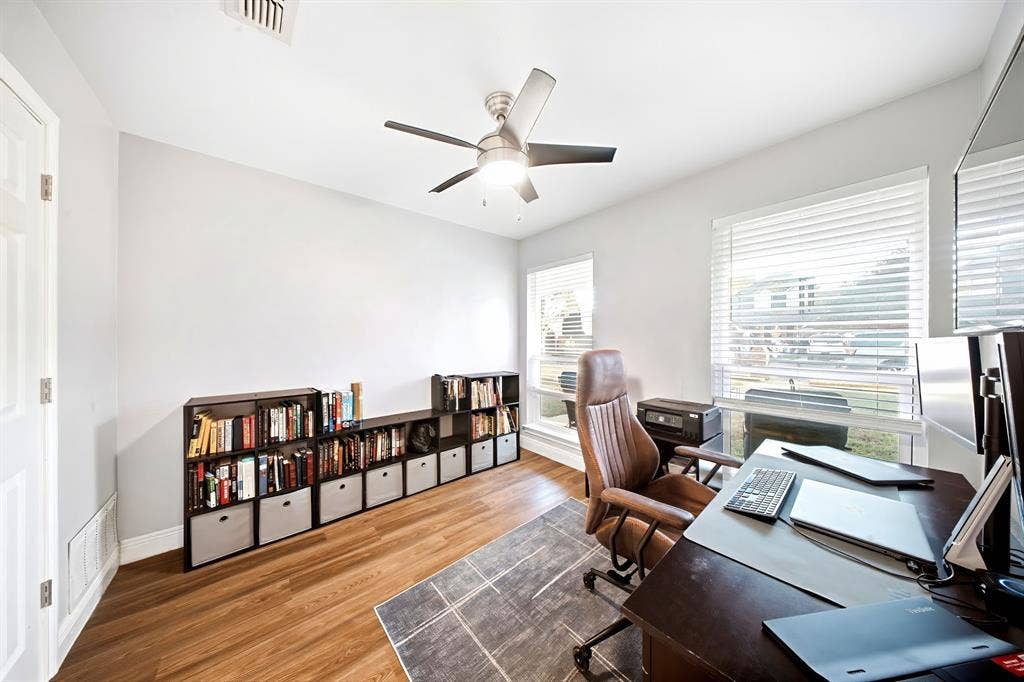 506 Amy Jo Circle, Aubrey, TX 76227 Wood-finish flooring, white walls, and a ceiling fan with integrated lighting