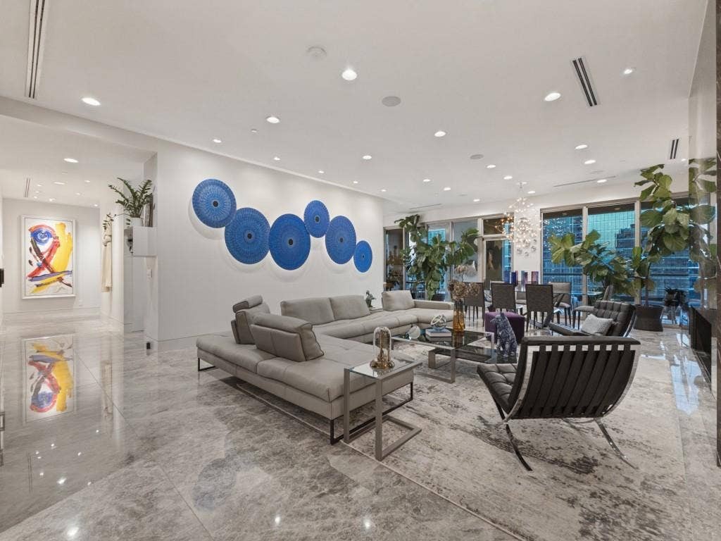 2300 Wolf Street, #14A, Dallas, TX 75201 Spacious interior featuring marble-finish flooring and extensive recessed lighting