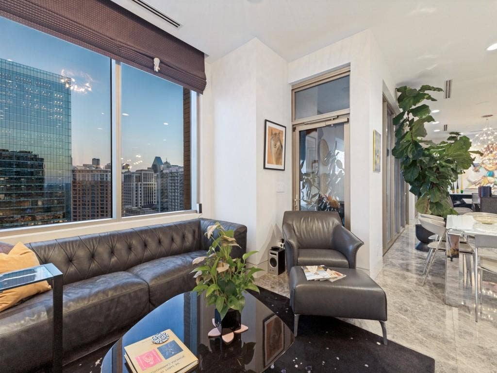 2300 Wolf Street, #14A, Dallas, TX 75201 Expansive windows with cityscape, recessed lighting, and elegant hard surface flooring