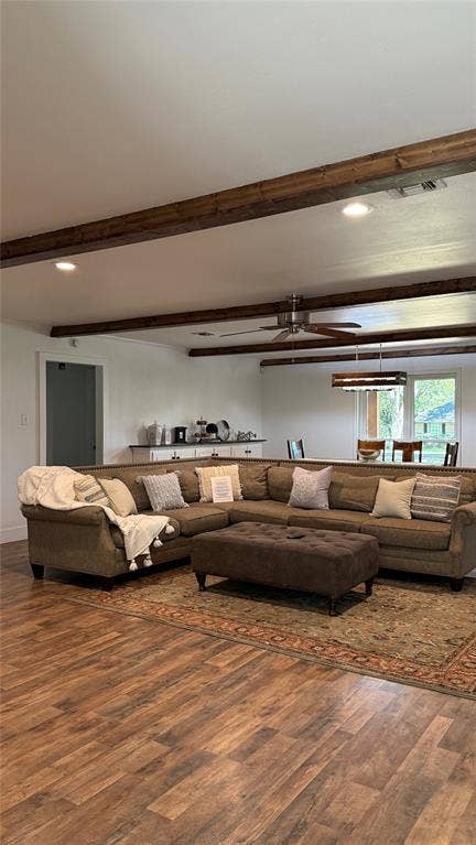 8513 Ravenswood Road, Granbury, TX 76049 Wood-finish flooring throughout, complemented by exposed ceiling beams