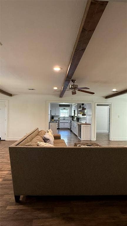 8513 Ravenswood Road, Granbury, TX 76049 Wood-finish flooring throughout, exposed ceiling beams, recessed lighting, and a ceiling fan