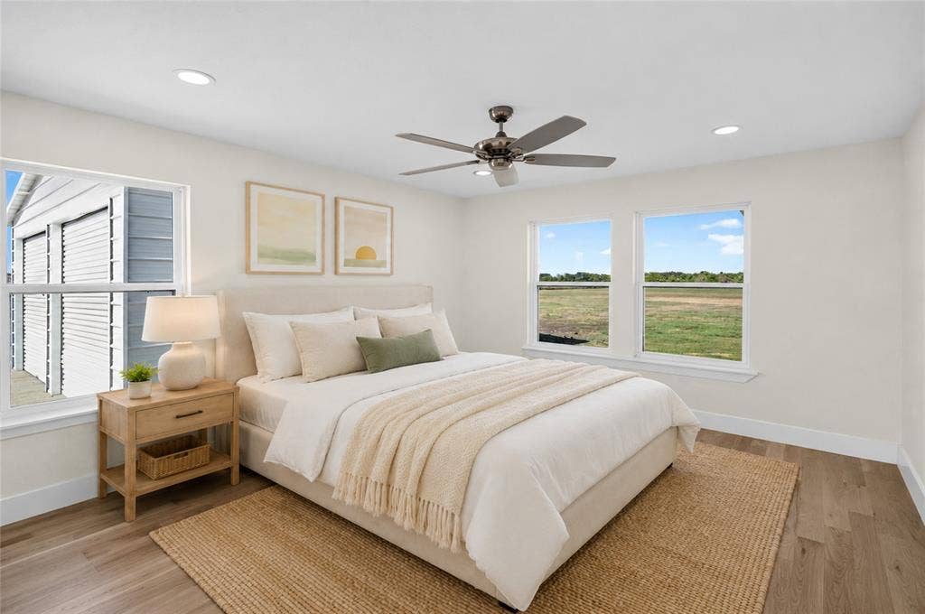 15166 FM 3133, Anna, TX 75409 Bedroom featuring wood-finish flooring, recessed lighting, and a ceiling fan - Virtually Staged