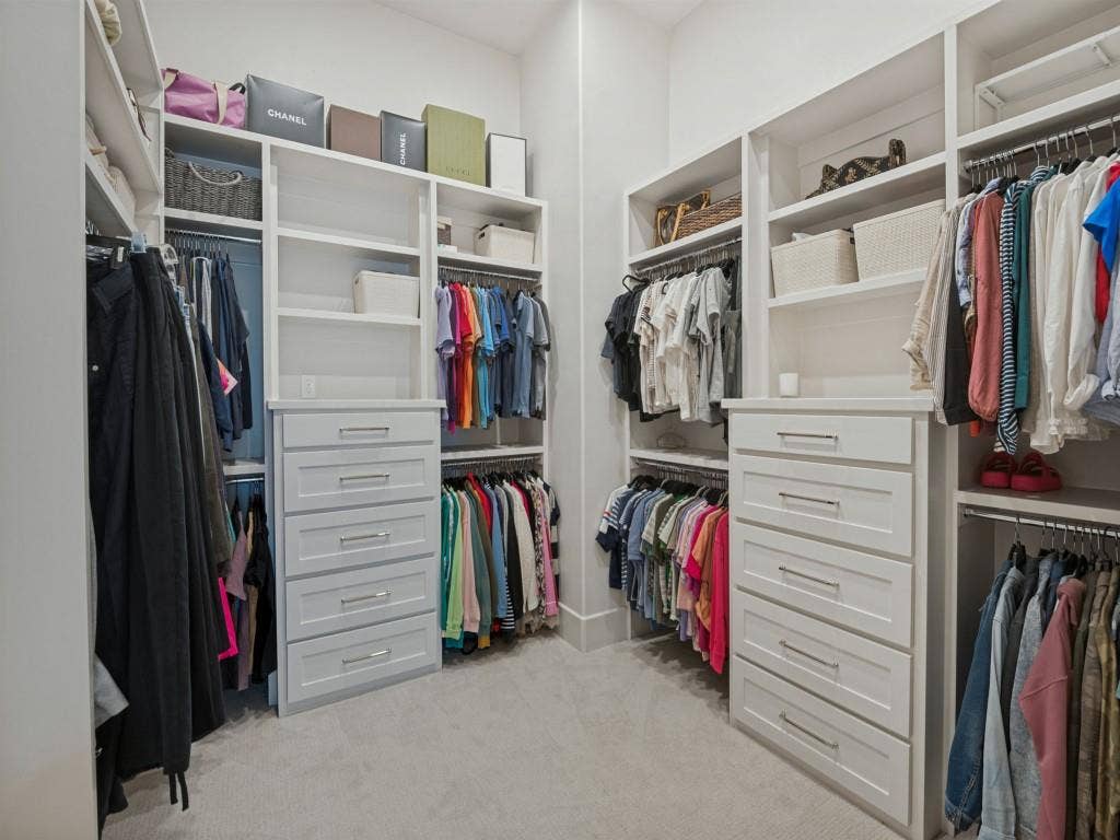 6801 Corporate Drive, #C2, Plano, TX 75024 Two banks of drawers and lots of hanging space compliment the primary closet.
