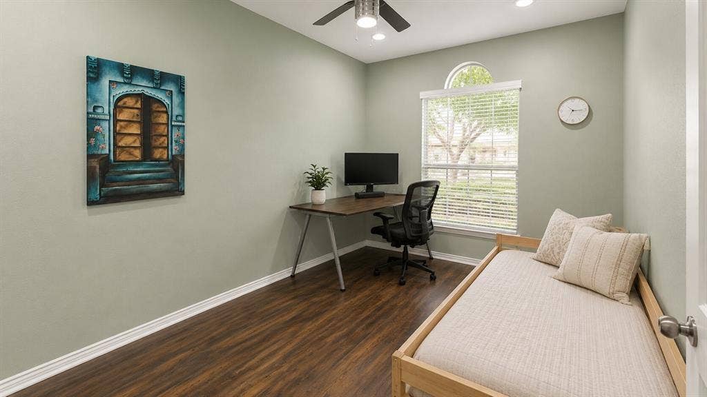 7004 Canyonbrook Drive, Plano, TX 75074 Recessed lighting, wood-finish flooring, ceiling fan, arched window, and window blinds