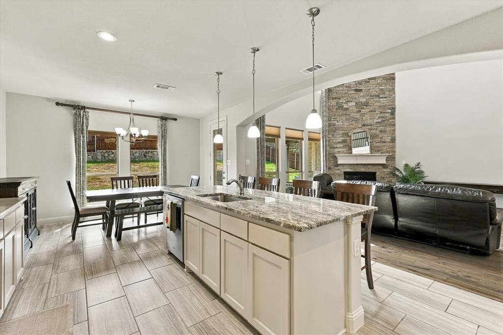 The kitchen is open to the dining area