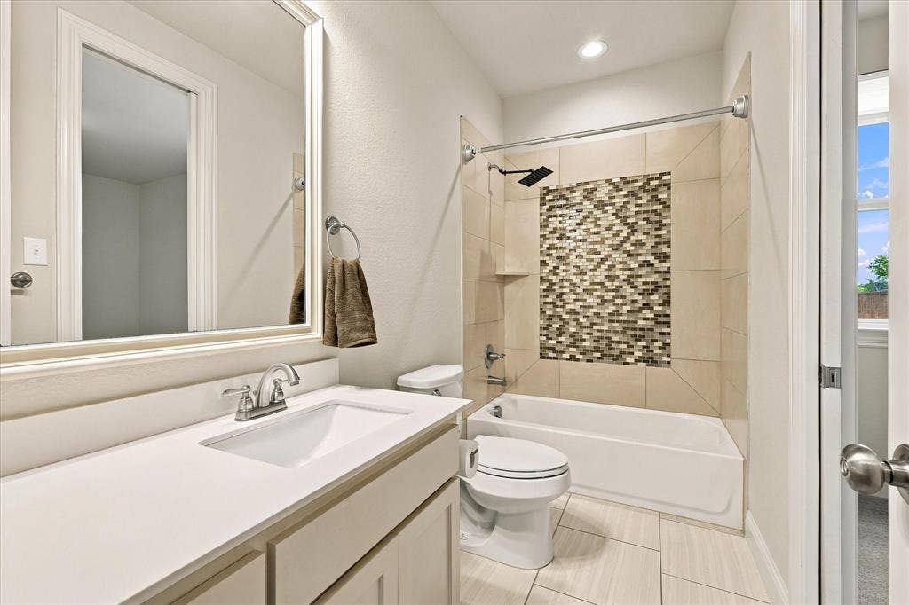 The full bathroom downstairs is an ensuite bath, but has a second entrance for a guest bath