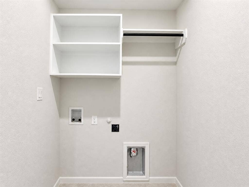 2234 Somercrest Place, Midlothian, TX 76065 Built-in shelving, hanging rod, and utility hookups