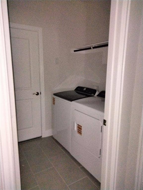 601 Willet Drive, McKinney, TX 75069 Dedicated laundry area featuring tile flooring and an integrated shelf
