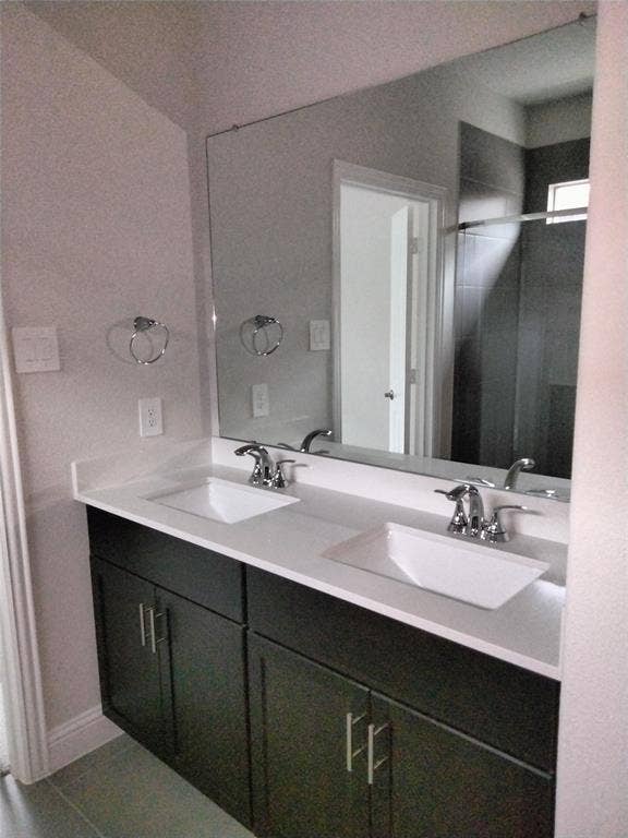 601 Willet Drive, McKinney, TX 75069 Dual vanity with white countertop and integrated rectangular sinks