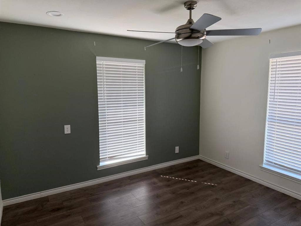 2928 Almeta Lane, McKinney, TX 75069 Wood-finish flooring, dual windows with blinds, contemporary ceiling fan, recessed lighting, and a two-tone wall treatment