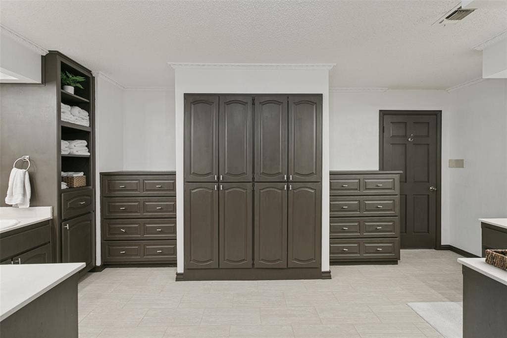 6801 Bellaire Court S, Benbrook, TX 76132 Build in dressers and cabinets for ample storage