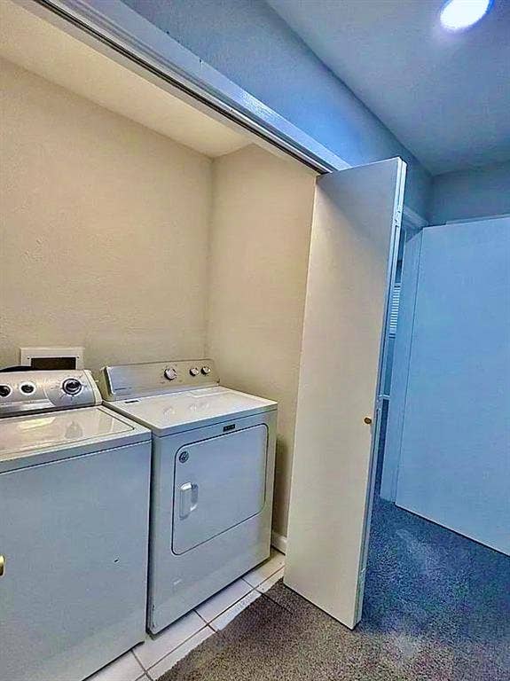 2115 N 9th Street, Temple, TX 76501 Laundry area featuring a ceiling-mounted light fixture and tile flooring