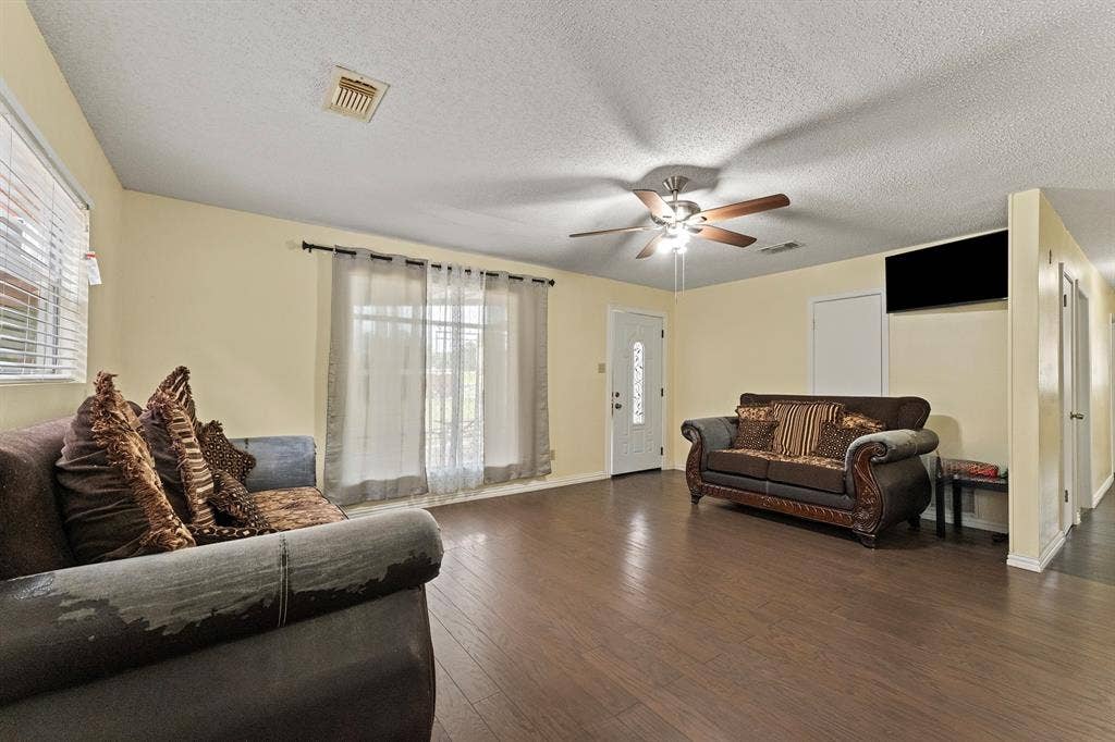 5989 State Highway 31 E, Murchison, TX 75778 Wood-finish flooring throughout, paired with light-toned walls