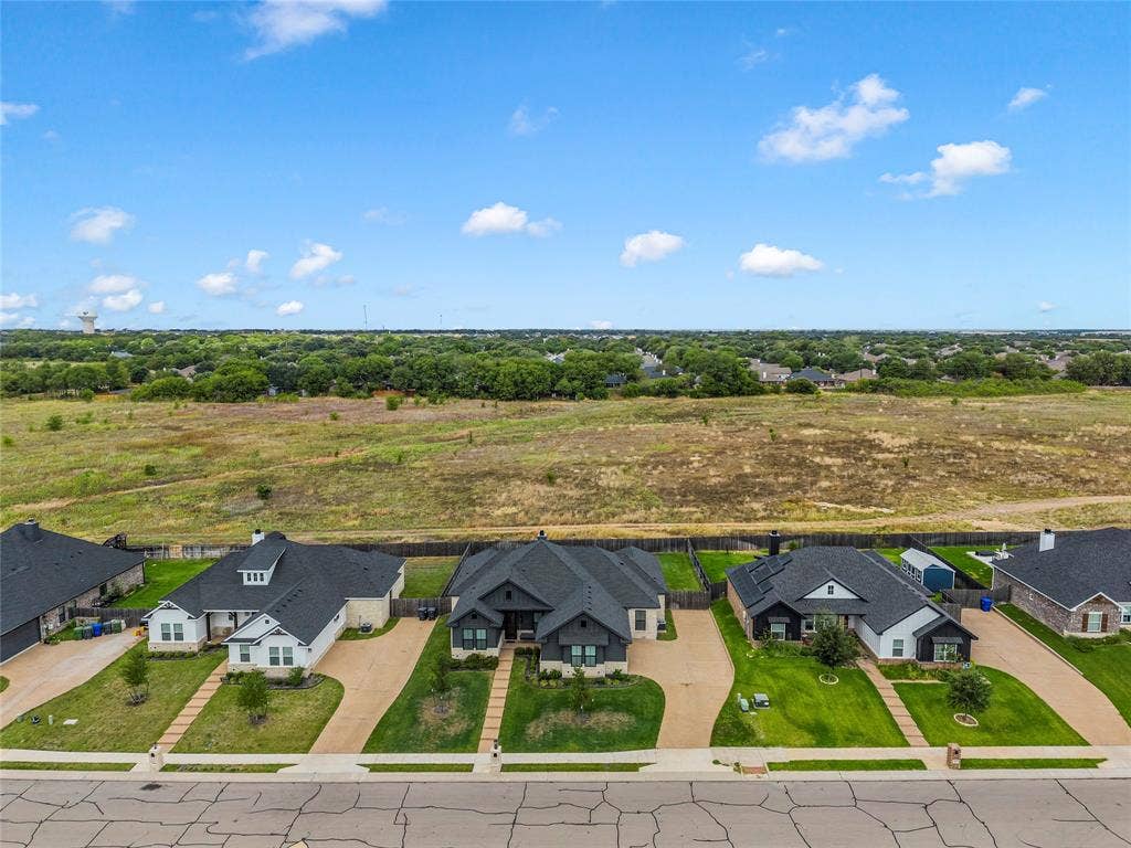 10201 Castleberry Lane, Waco, TX 76712 Aerial perspective showcasing multiple properties