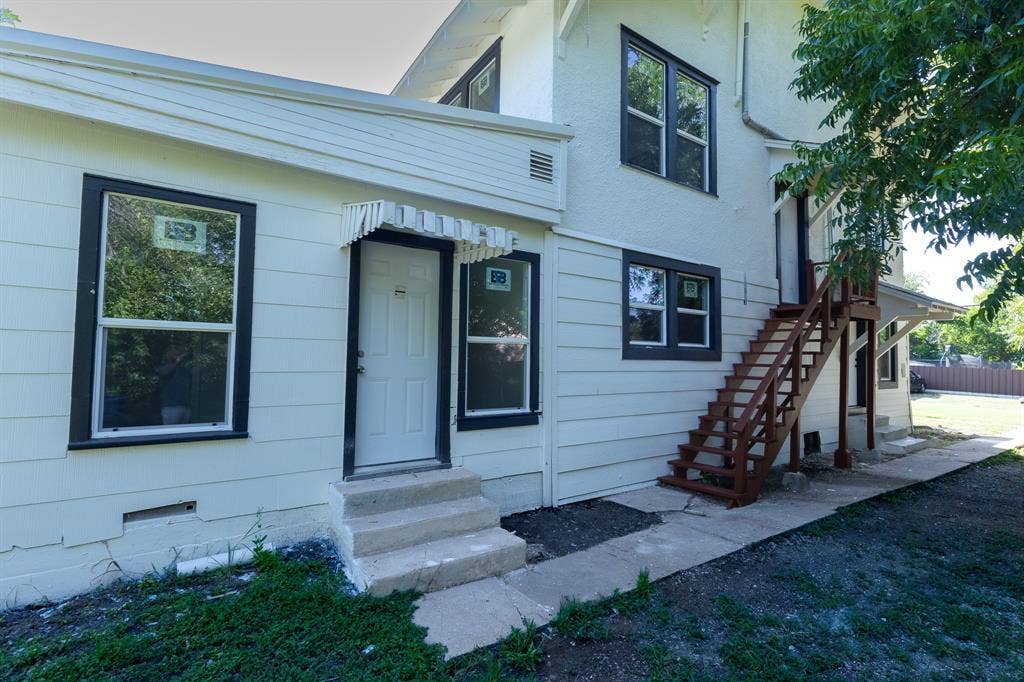 1702 Ethel Avenue, Waco, TX 76707 Multi-level exterior with white siding and dark trim