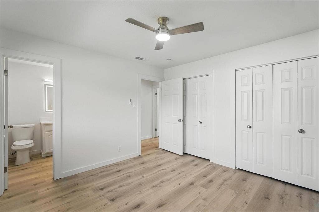 810 Greenhaven Drive, Richardson, TX 75080 Primary Bedroom with en suite bath and double closets.