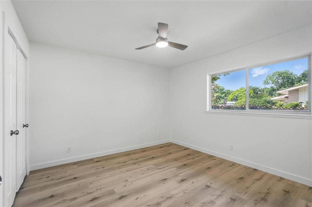 810 Greenhaven Drive, Richardson, TX 75080 Primary Bedroom with en suite bath and double closets.