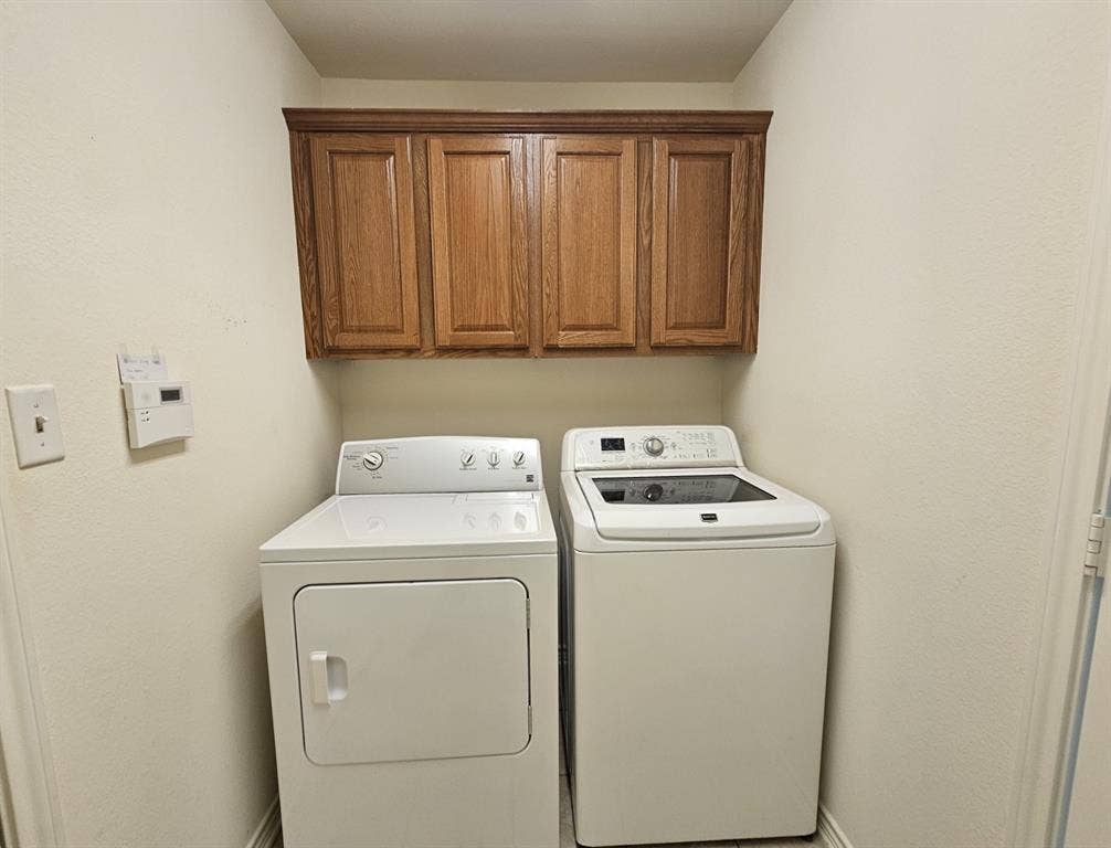 1521 Rice Road, #Z-101, Tyler, TX 75703 Tray ceiling with crown molding, ceiling fan with light fixture, carpeted flooring, and a window with blinds