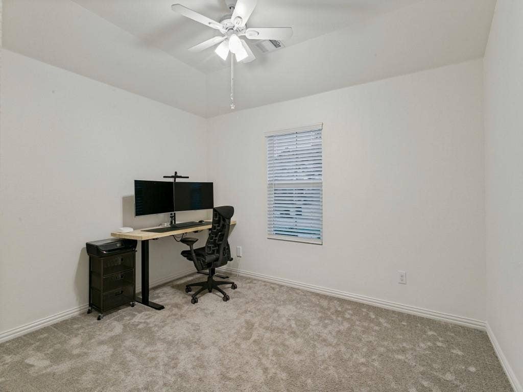 5513 Baker Creek Road, Fort Worth, TX 76126 Recessed ceiling with an installed ceiling fan, single window with blinds, and light-toned carpeting