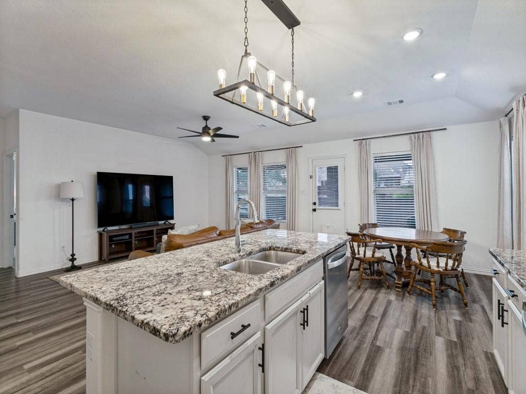 5513 Baker Creek Road, Fort Worth, TX 76126 Spacious kitchen island with stone countertop and double basin sink