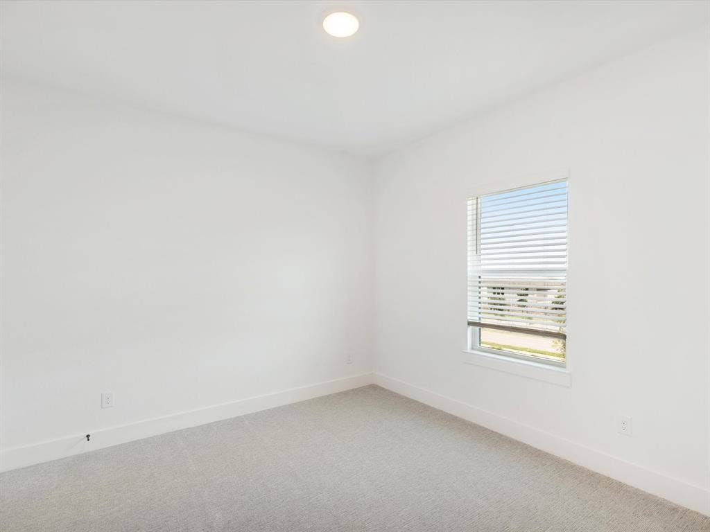 2317 Peters Colony Drive, Little Elm, TX 75036 Spare room featuring carpet flooring and recessed lighting
