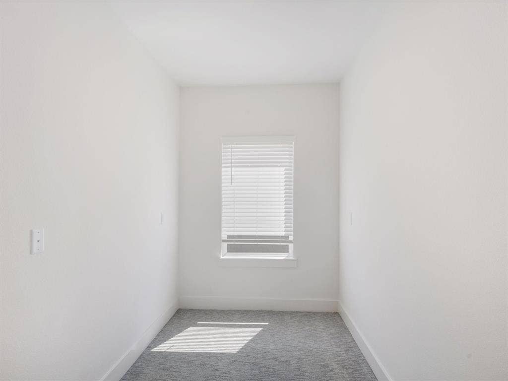 2317 Peters Colony Drive, Little Elm, TX 75036 Empty room with carpet and baseboards