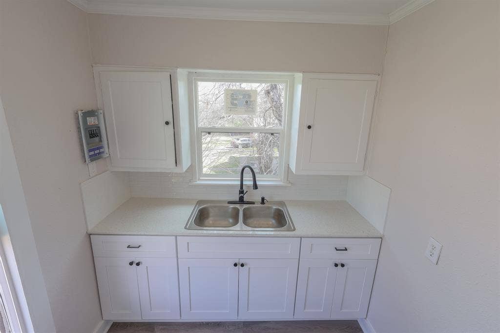 1704 Ethel Avenue, #B, Waco, TX 76707 White shaker-style cabinetry with matte black hardware