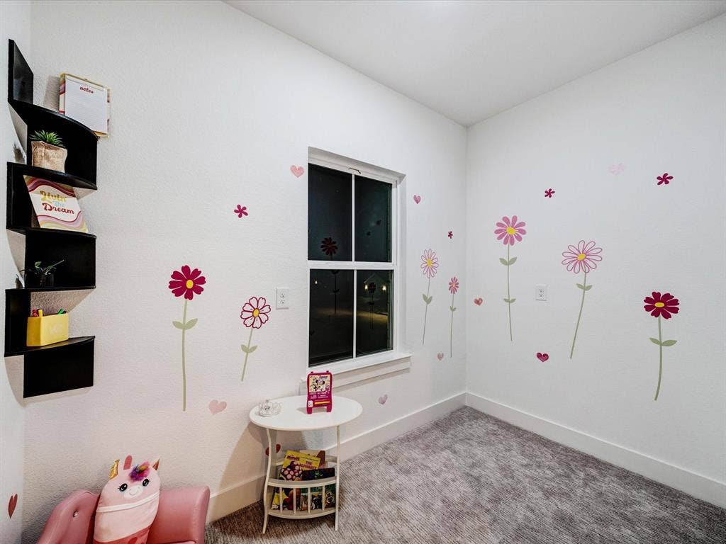 2313 Peters Colony Drive, Little Elm, TX 75036 Rec room with carpet floors and baseboards