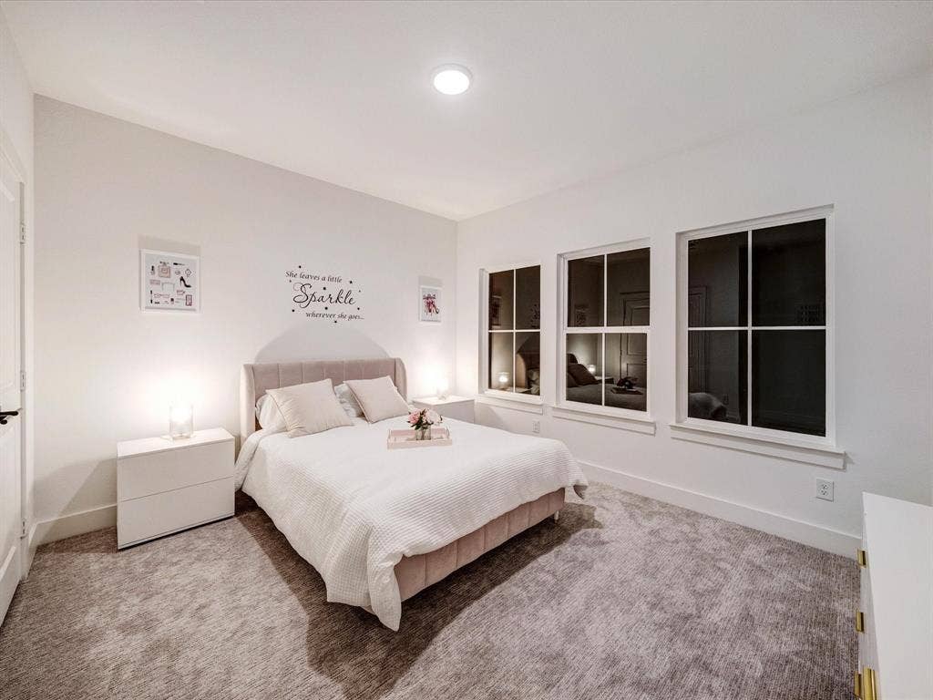 2313 Peters Colony Drive, Little Elm, TX 75036 Carpeted bedroom with baseboards
