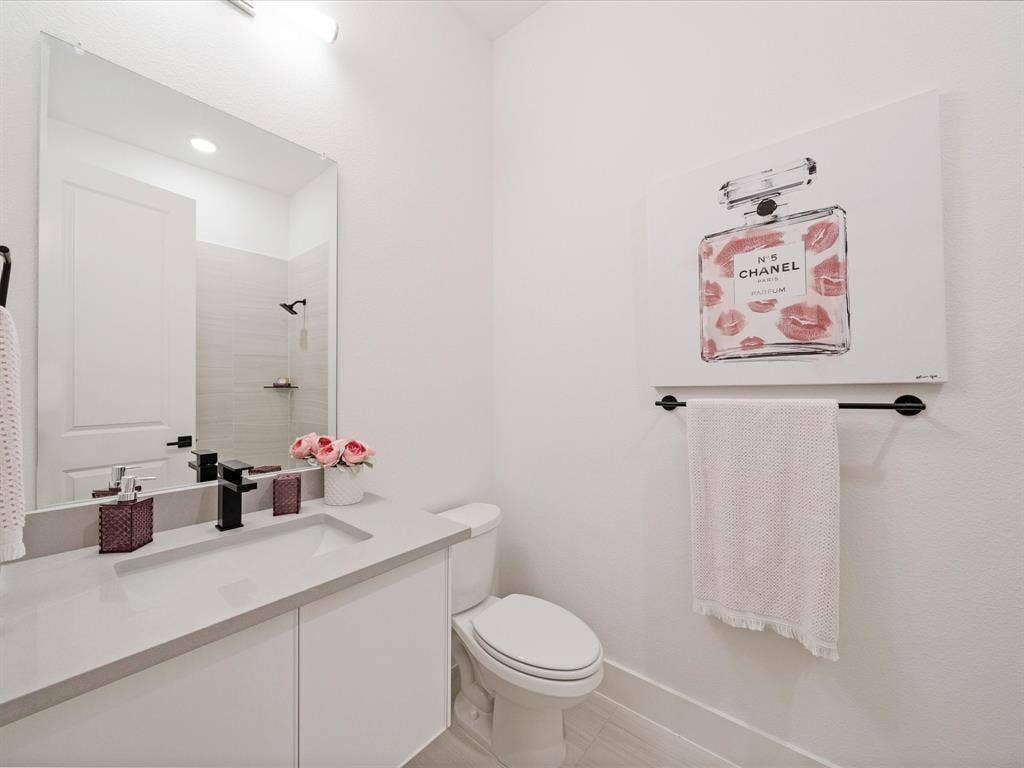 2313 Peters Colony Drive, Little Elm, TX 75036 Full bath featuring vanity, tiled shower, and light tile patterned floors