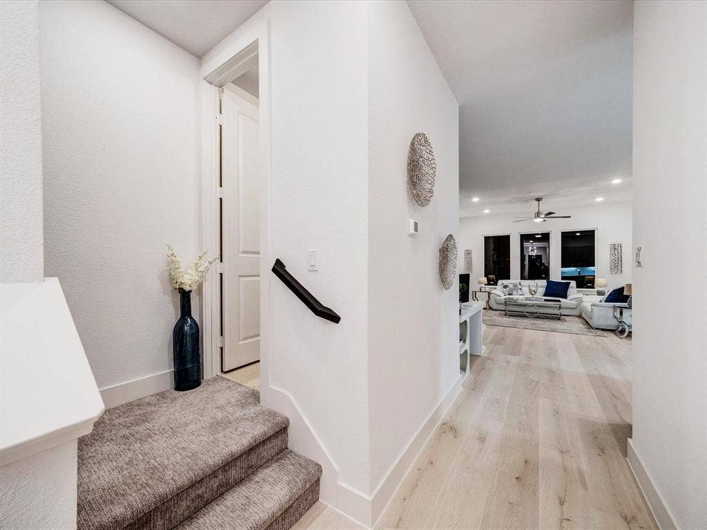 2313 Peters Colony Drive, Little Elm, TX 75036 Hall with light wood finished floors and recessed lighting