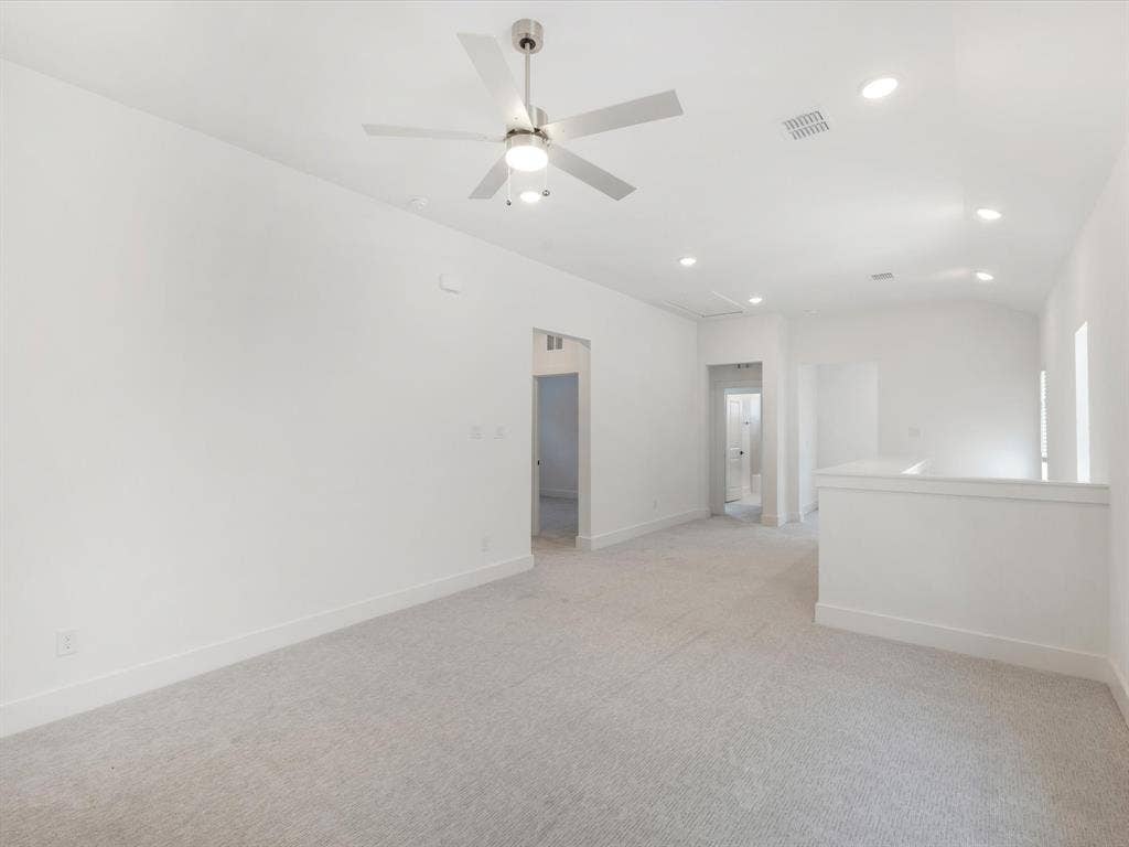Game room featuring light carpet, recessed lighting, attic access, and a ceiling fan