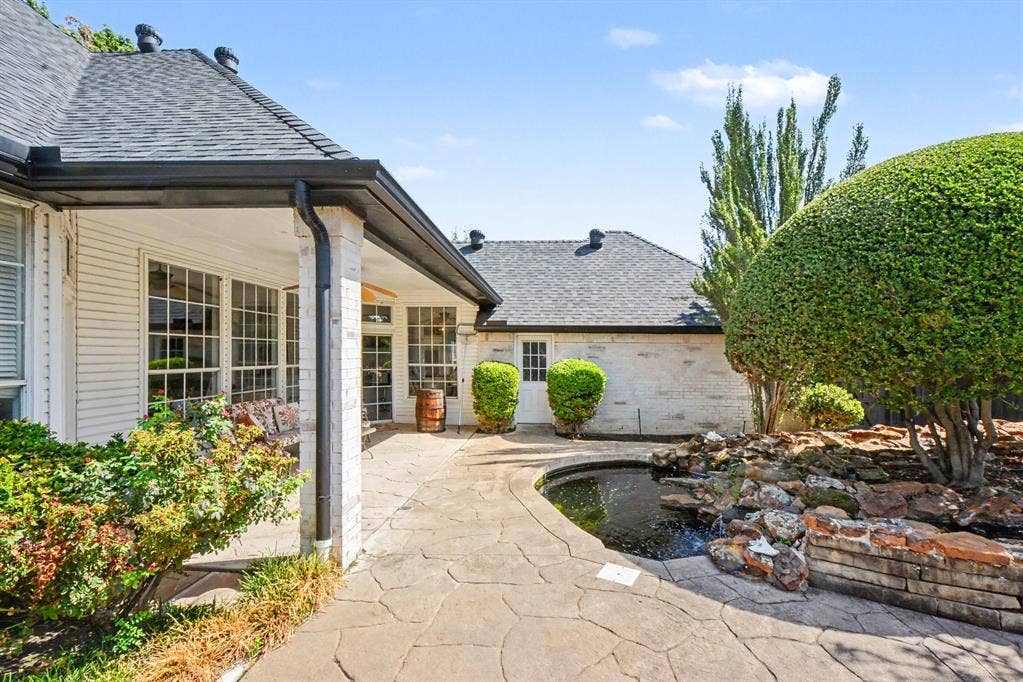 18824 Fortson Avenue, Dallas, TX 75252 Covered patio and koi pond